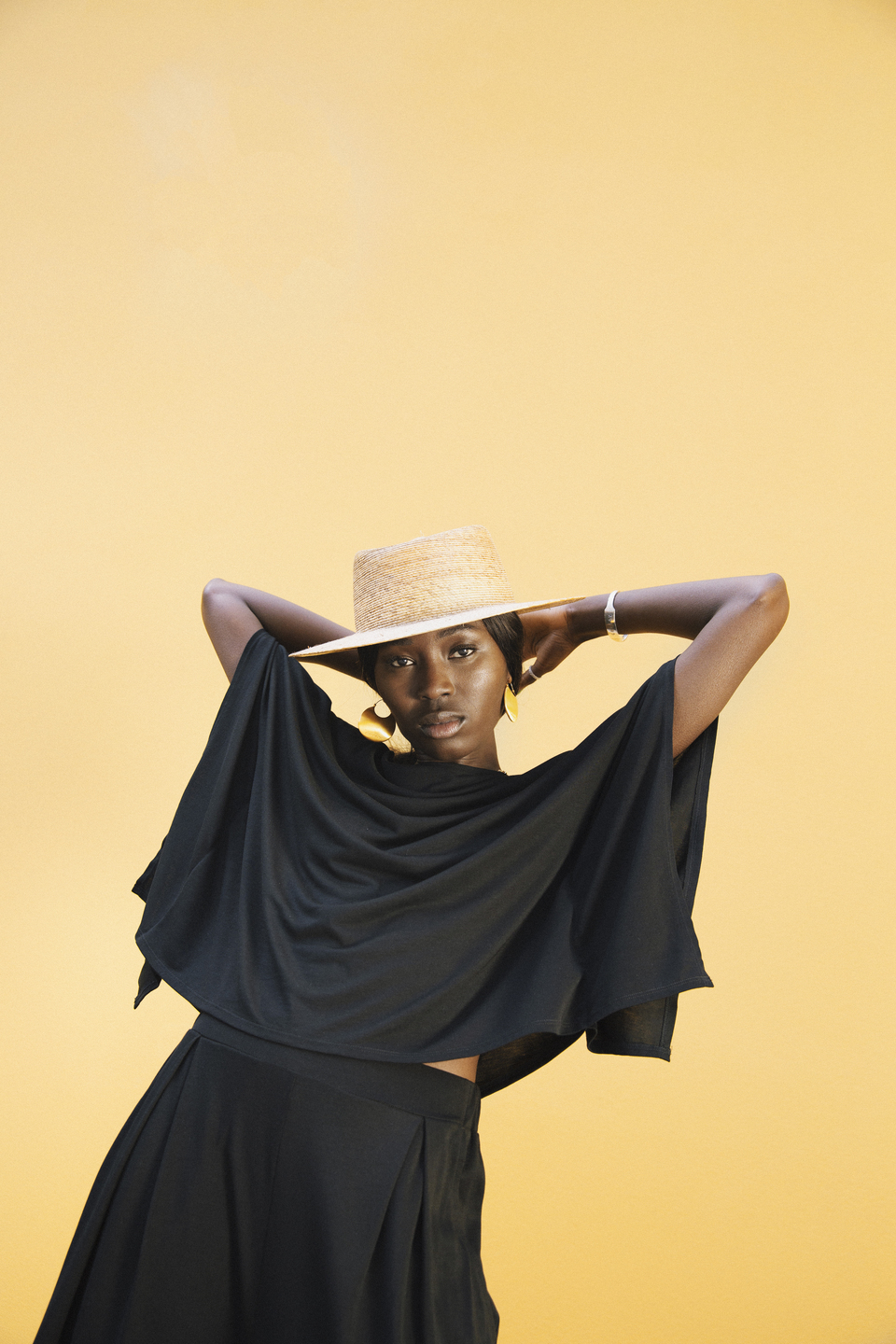 AWAN black draped top and trousers with straw hat